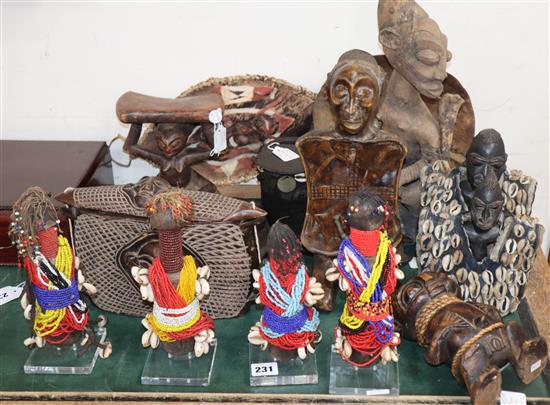 A quantity of ethnographical carvings, beadworks, metalwares and animal hides